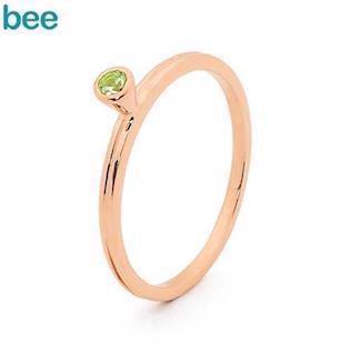 Pink gold plated ring in 9 ct. with green peridot